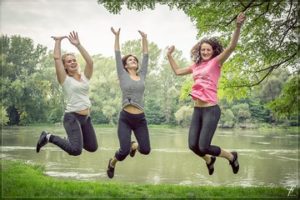 Happy people jumping