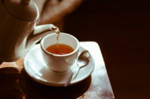 Tea poured into cup