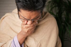 Woman Sneezing from Flu