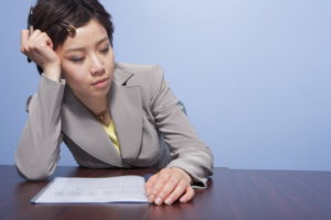 Tired businesswoman in office