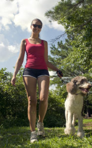 Woman walking a dog