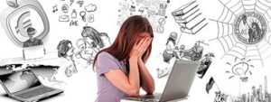 Upset woman in front of computer