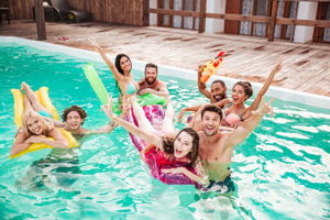 People having fun in a swimming pool