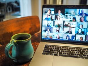 Zoom meeting shown on a laptop