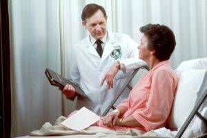 Doctor talking to patient in a hospital