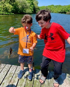 Children fishing at Camp Good Mourning 