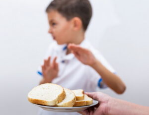 Kid refuses to eat white bread.